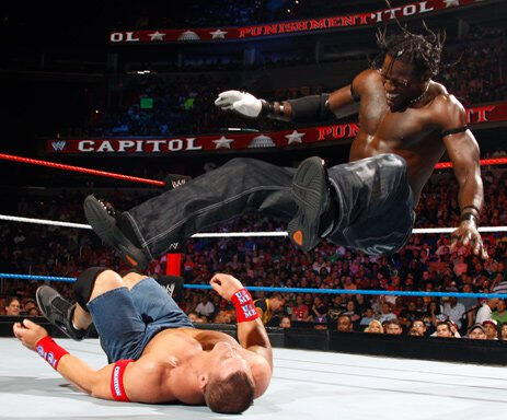 R-Truth leg drops John Cena in 2011.